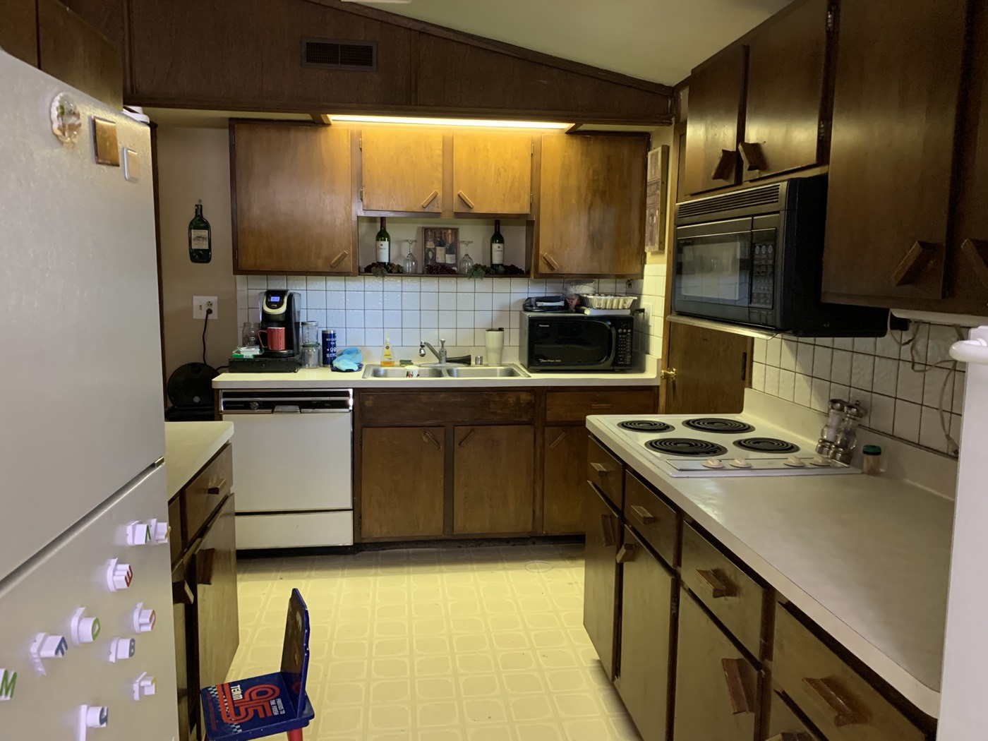 Kitchen before — Acorn Properties renovation
