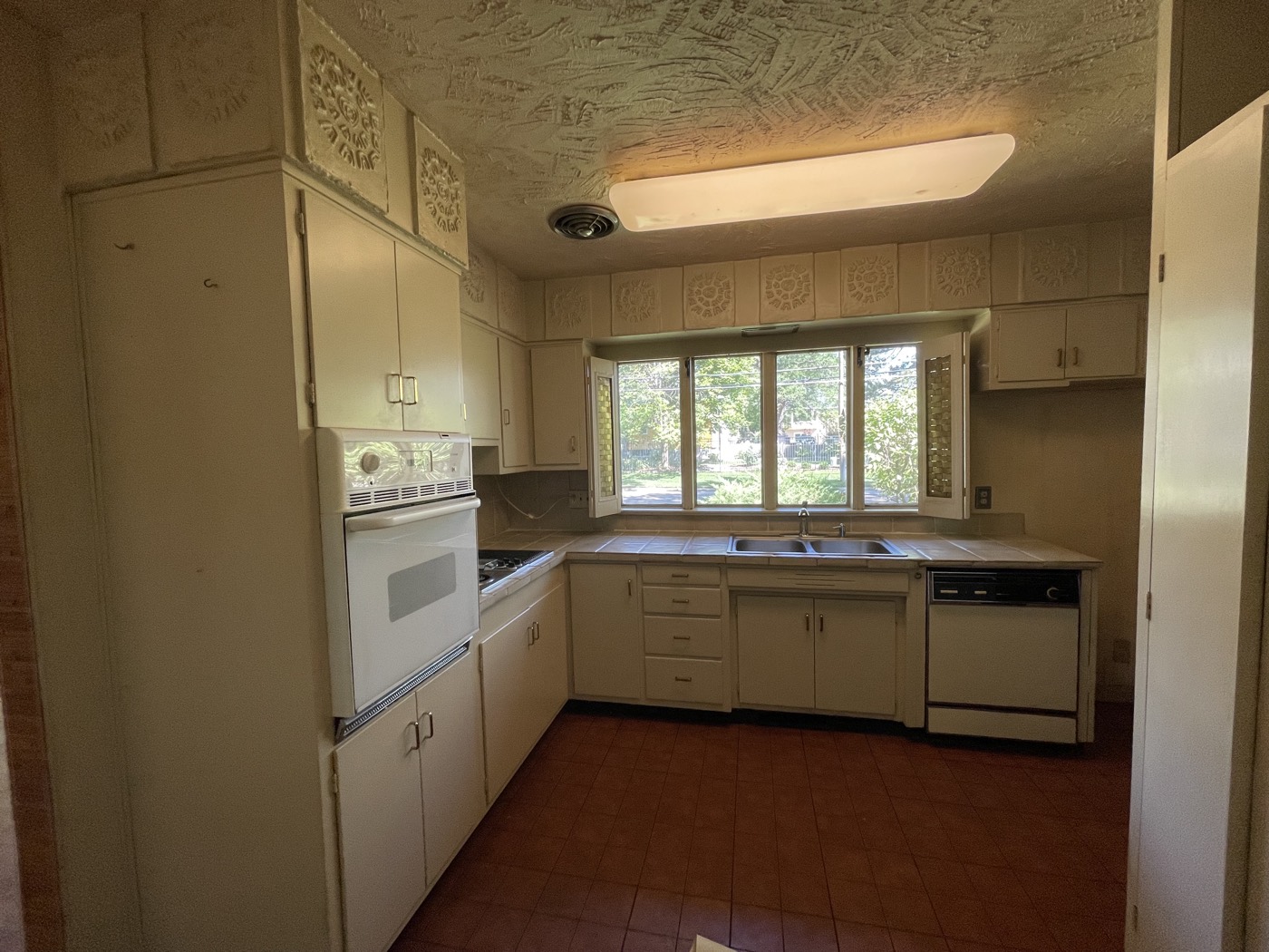 Kitchen before — Acorn Properties renovation