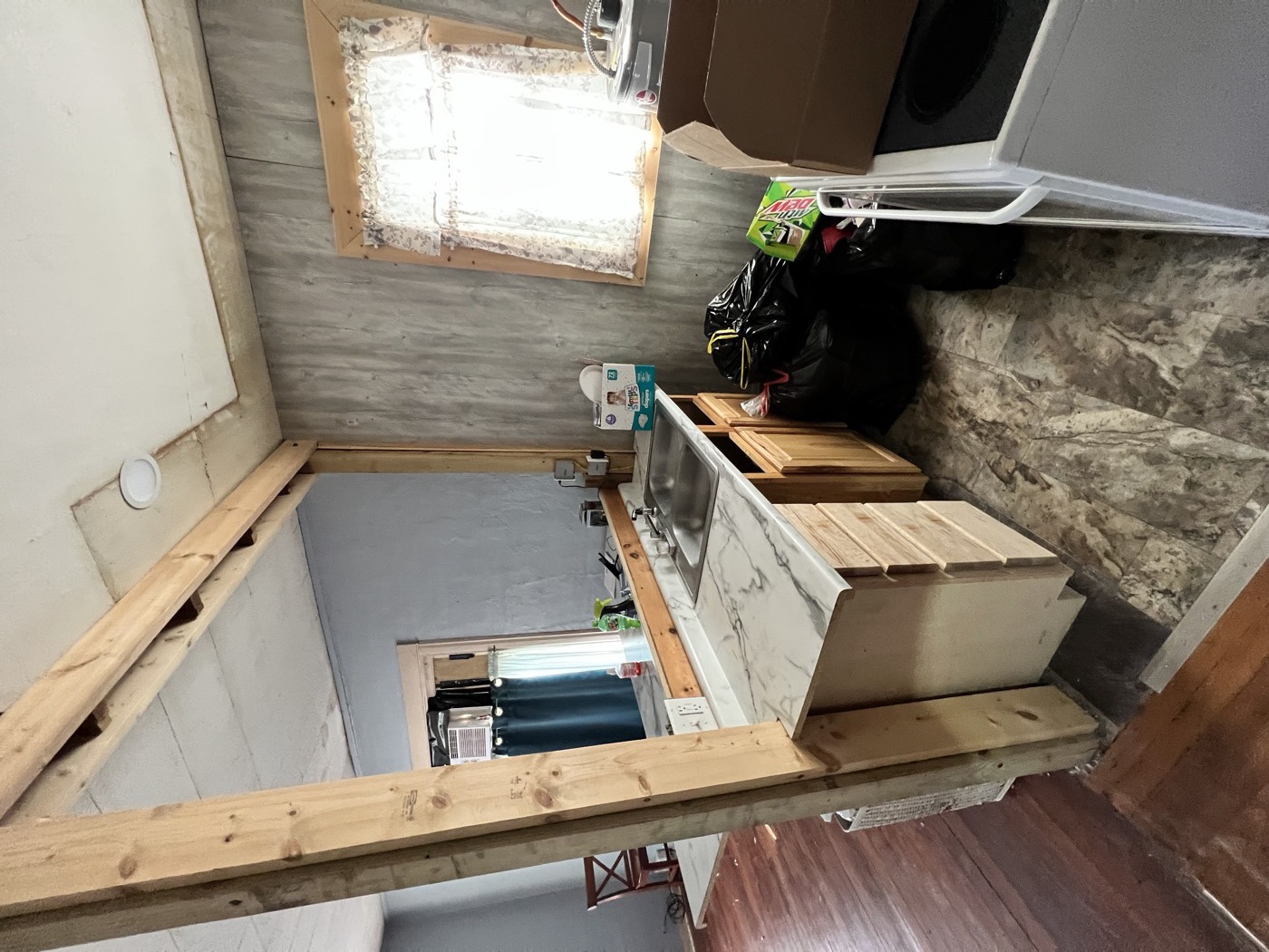 Kitchen before — Acorn Properties renovation